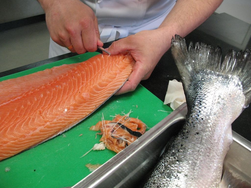 A cook working at the open kitchen